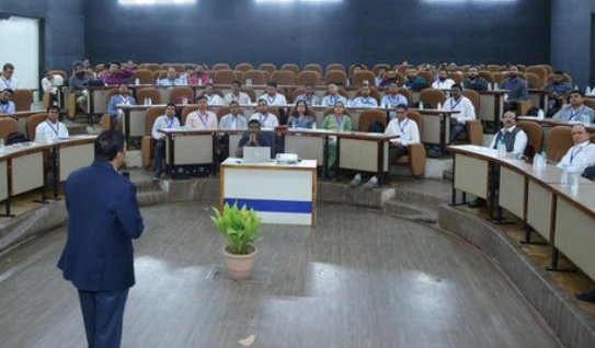 Participants in the summit auditorium
