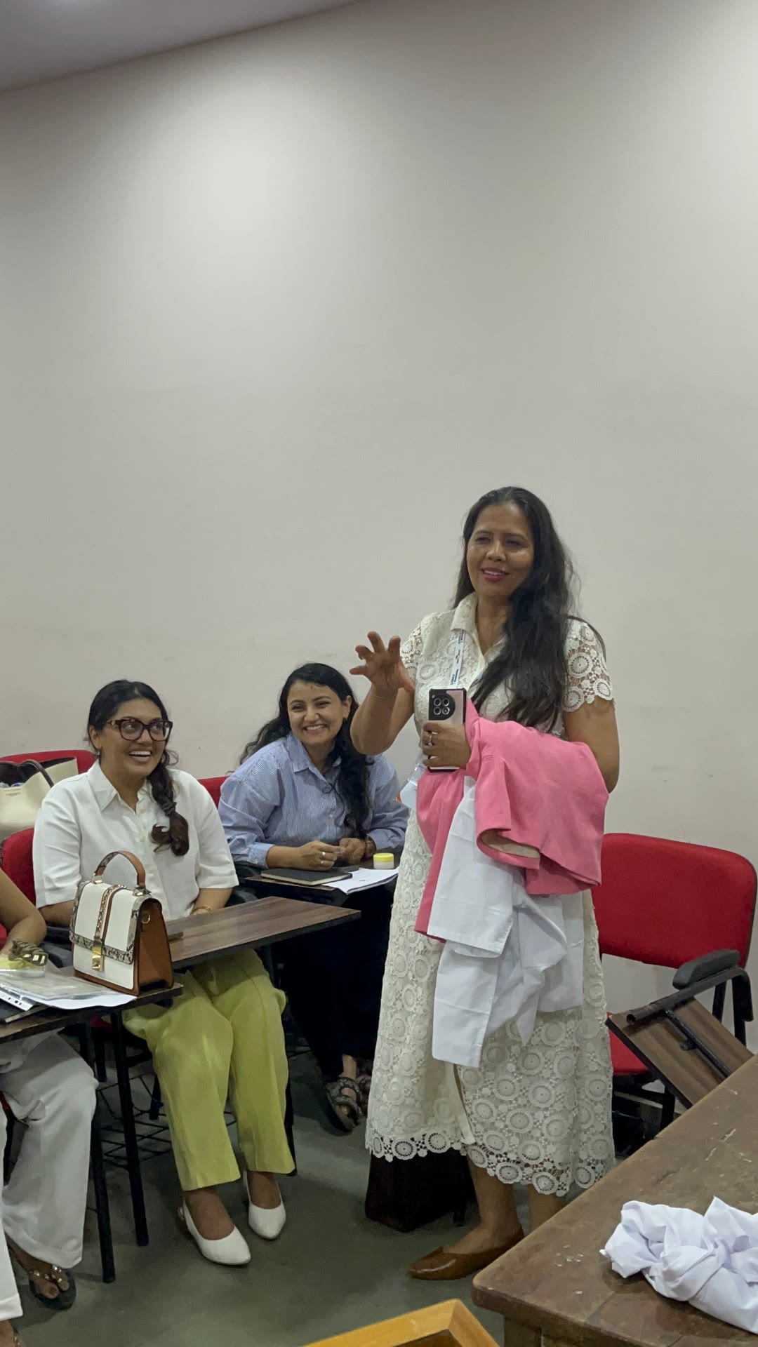 A speaker presenting to participants