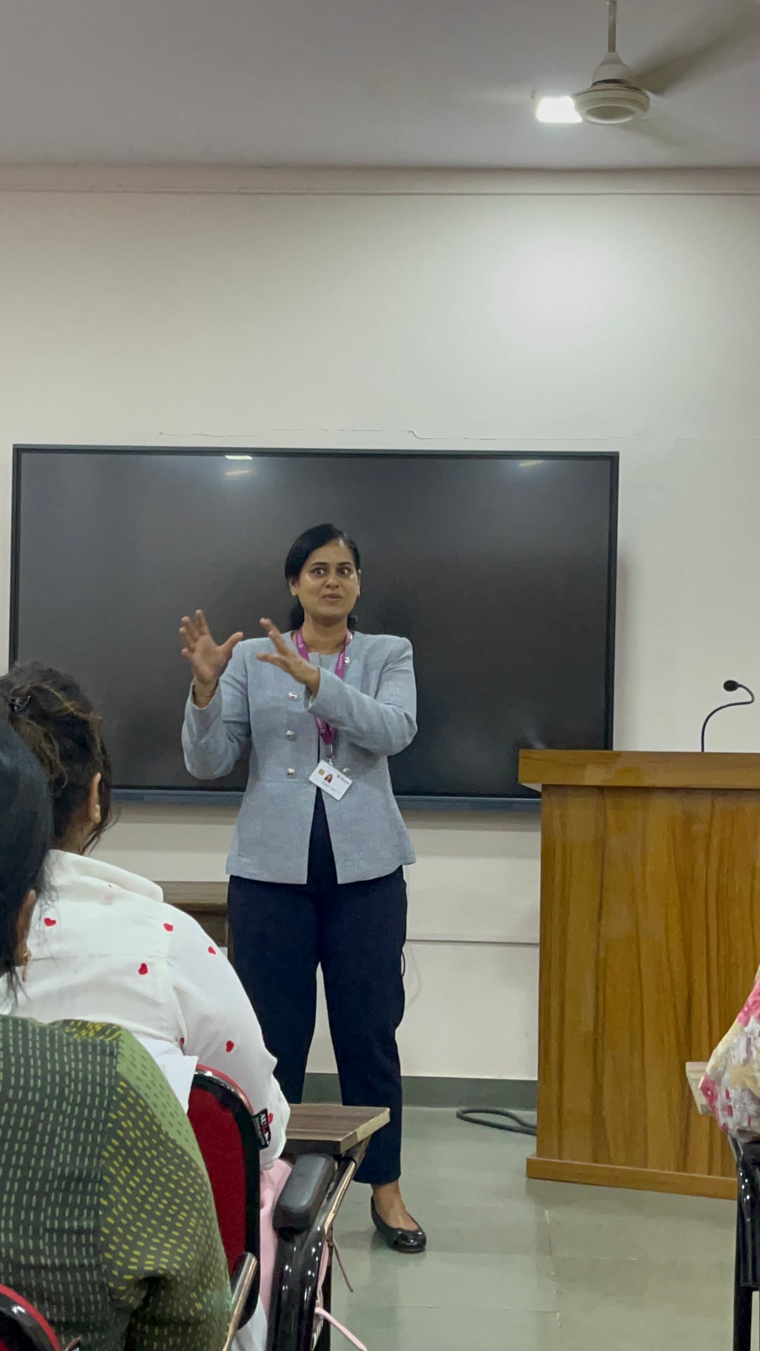 A mentor with participants in the classroom